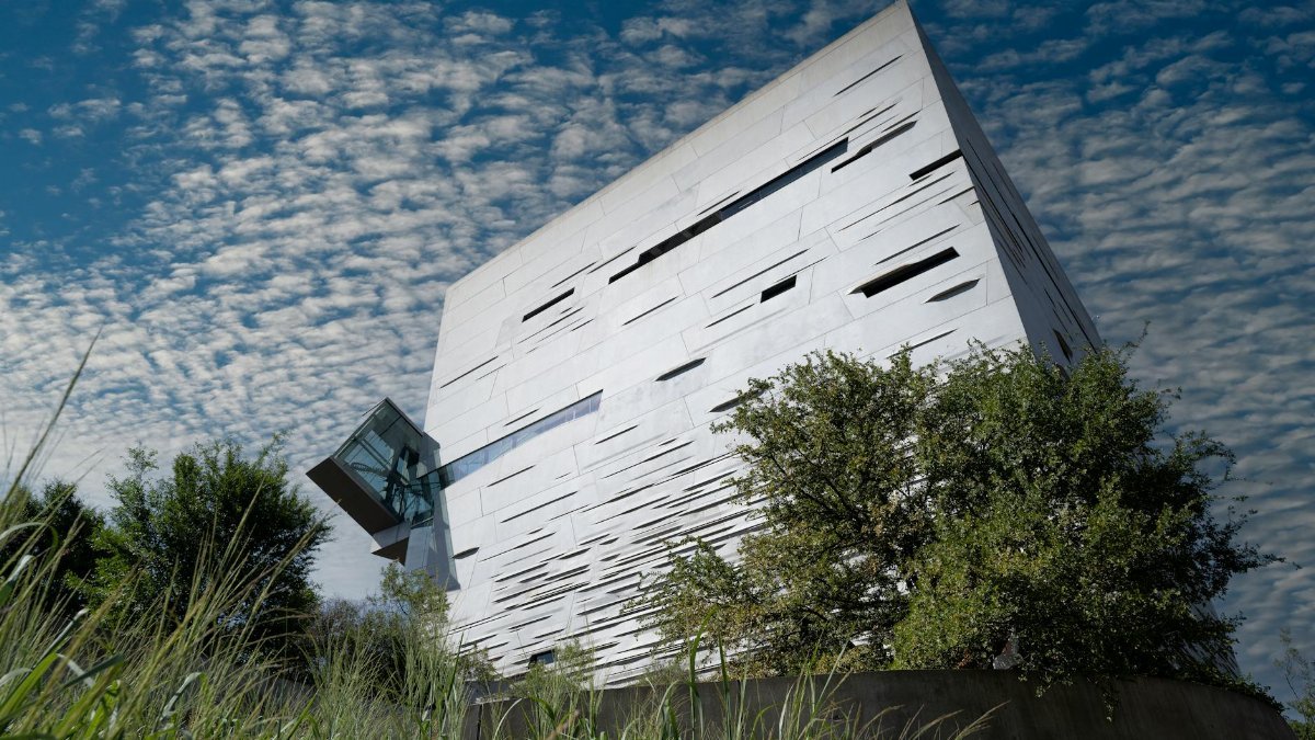 Striking modern architecture against a dynamic sky, captured in Dallas, Texas.