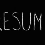 Blackboard with the word 'Resume' written in chalk. Ideal for educational or conceptual themes.