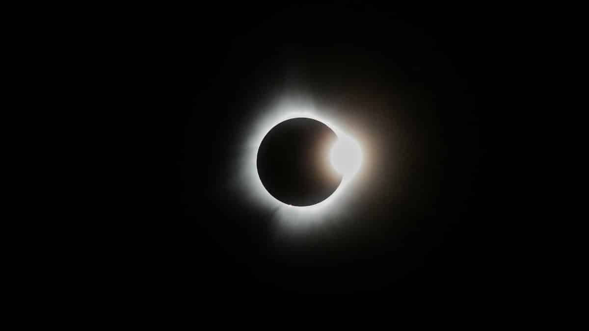 Capture of a breathtaking solar eclipse showcasing the sun's corona and lunar silhouette.
