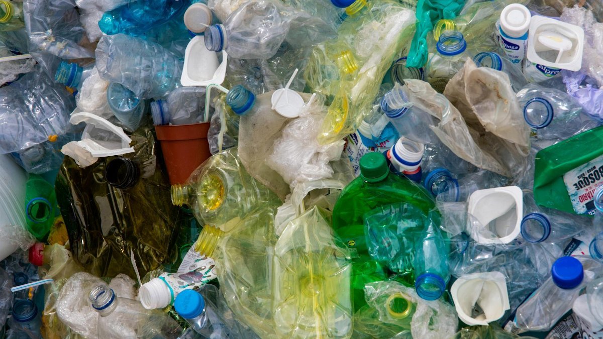 Pile of assorted plastic waste highlighting recycling and sustainability efforts.