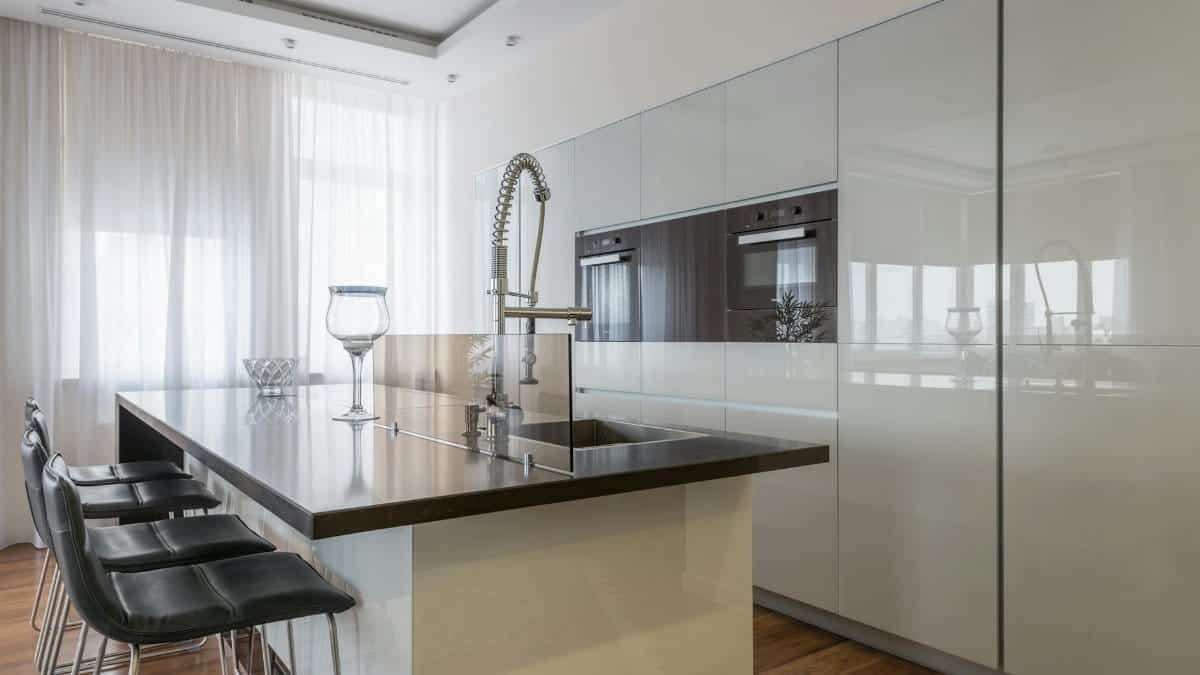 Stylish modern kitchen with an island and sleek cabinetry, perfect for contemporary living.