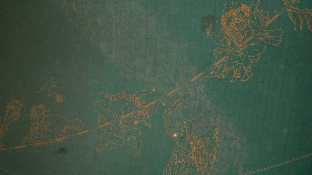 Illustration of zodiac signs on a historic astronomical ceiling, showcasing intricate details and vintage charm.
