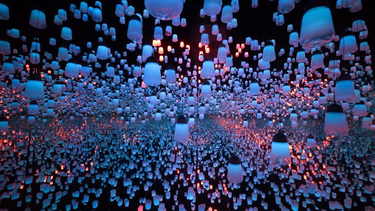 A mesmerizing display of colorful hanging lanterns in a Tokyo art museum.