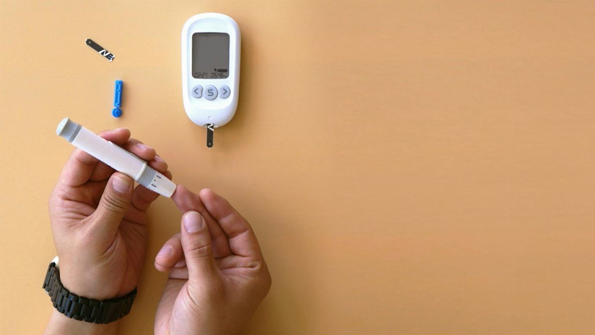 Hands testing blood sugar with a glucose meter on a beige background.