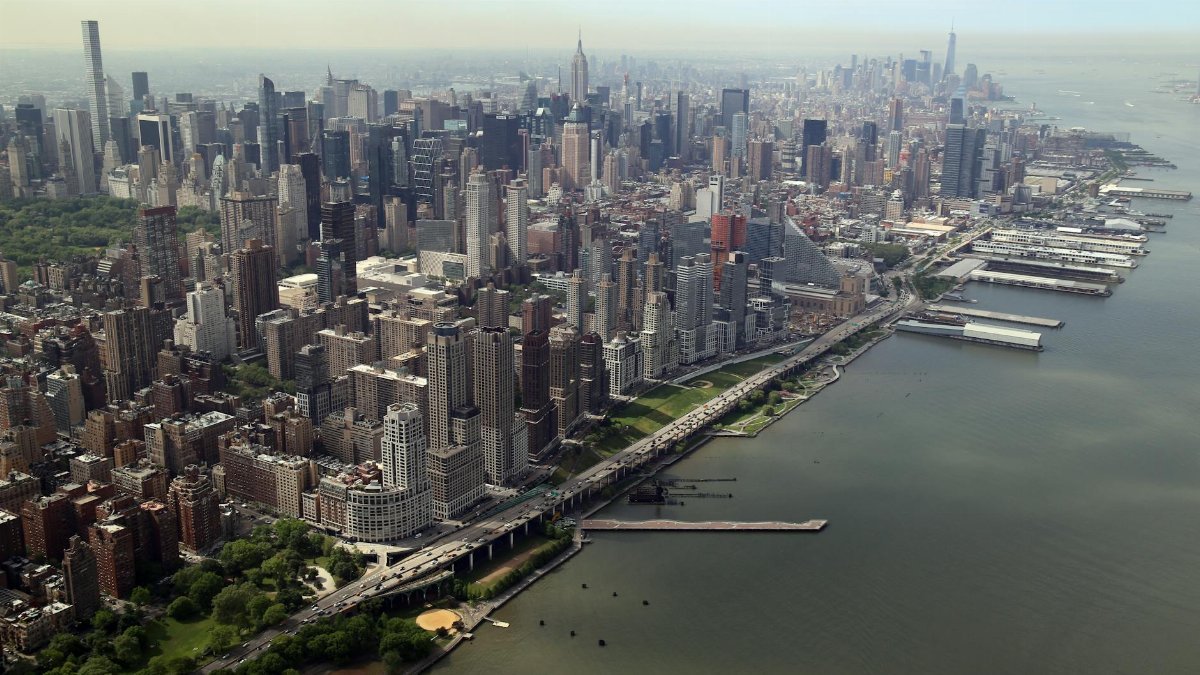A captivating aerial view of the Manhattan skyline in New York City, showcasing the iconic architecture and urban landscape.