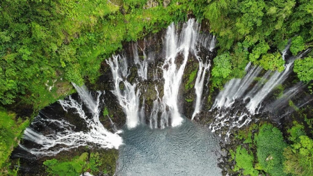 Stunning aerial shot of Grand Galet Falls in lush Reunion National Park.