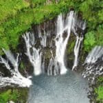 Stunning aerial shot of Grand Galet Falls in lush Reunion National Park.