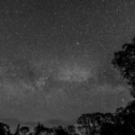 Captivating black and white view of a star-filled sky over Bristol, Maine.