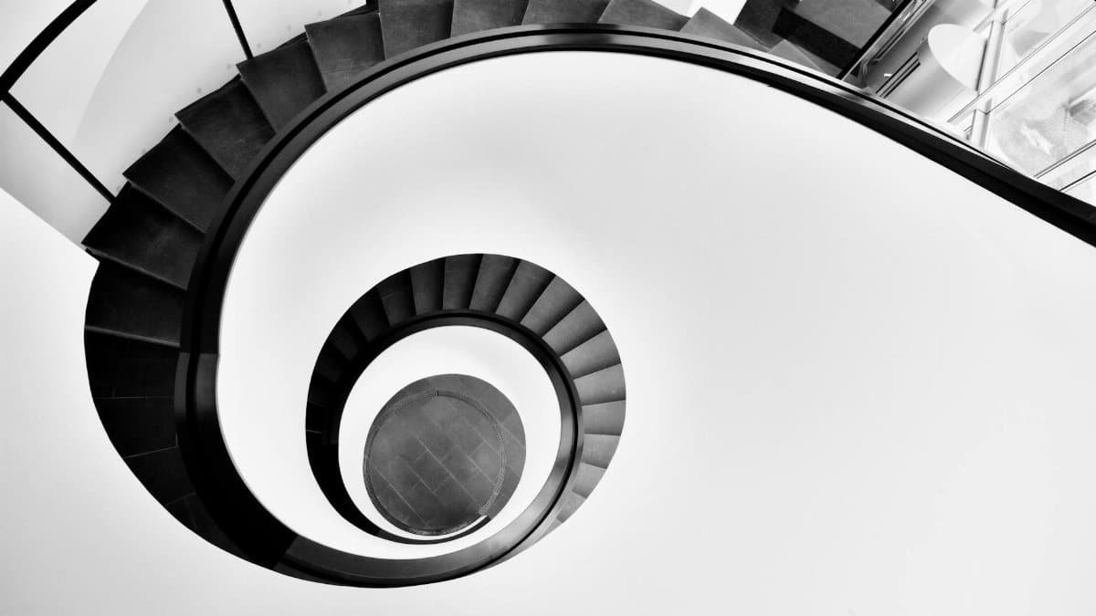 Artistic black and white photo of a spiral staircase in Nürnberg, Germany.