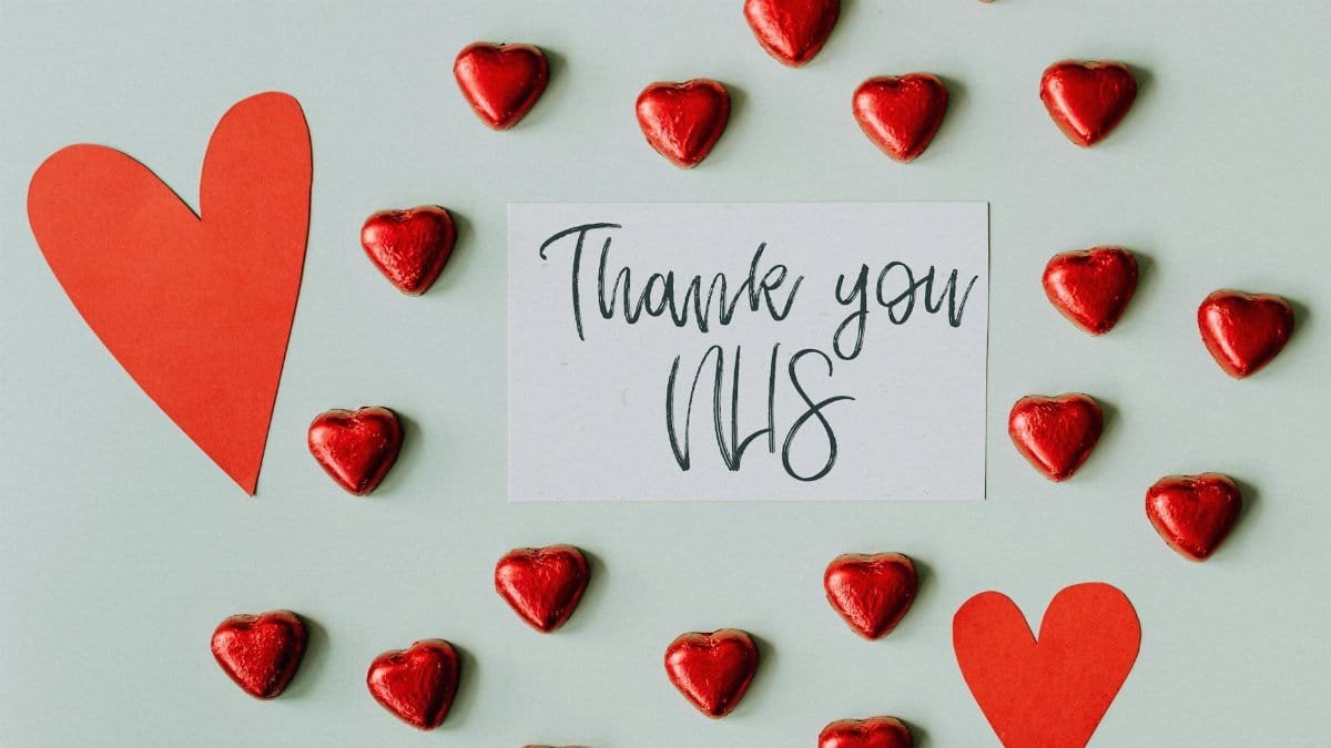A thank you card with red heart chocolates and text for NHS appreciation.