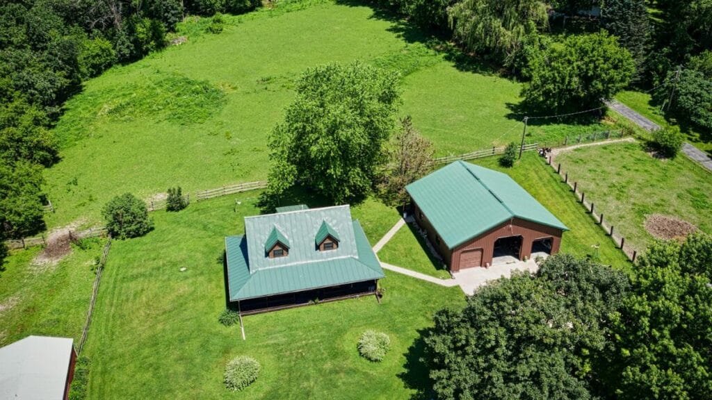 Aerial view of a countryside home in Dakota, Minnesota during summer.