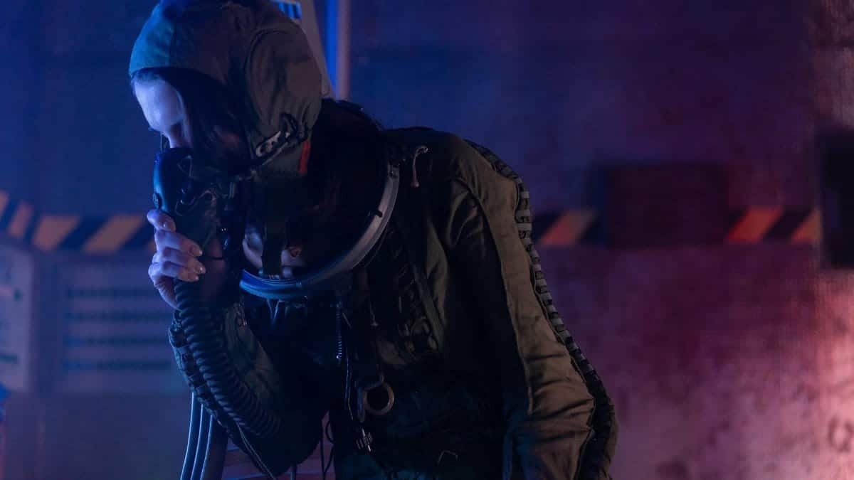 A weary astronaut in a spacesuit rests inside a futuristic spacecraft, conveying fatigue and exploration.