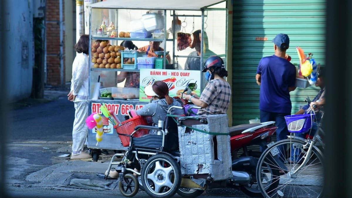 A vibrant snapshot of street food vendors in Vietnam, capturing daily life.
