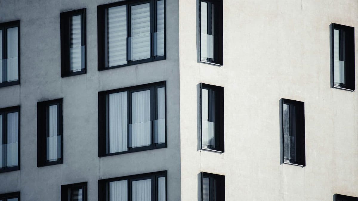 A modern building in Ilidža, Bosnia showcasing geometric design and light play.