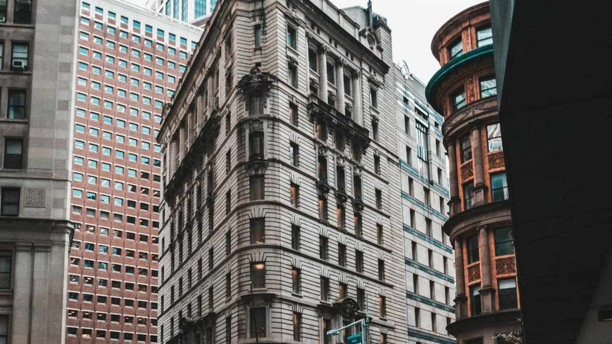 Dynamic view of architectural buildings in downtown Manhattan showcasing urban design.