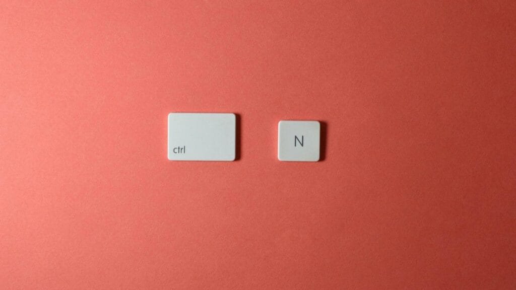 Two keyboard keys on a red background, depicting 'ctrl' and 'N'.