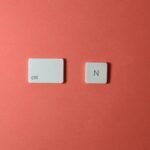 Two keyboard keys on a red background, depicting 'ctrl' and 'N'.