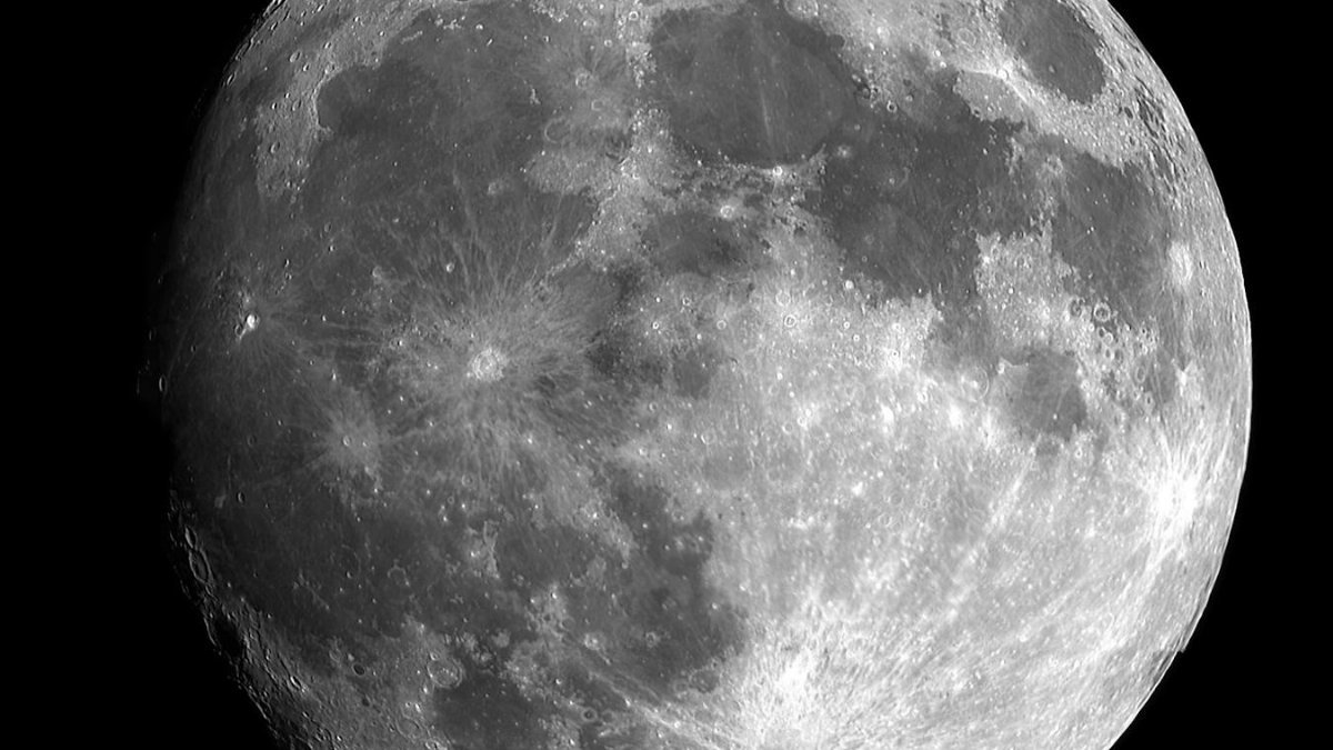 Captivating black and white image of the full moon showcasing intricate lunar details.
