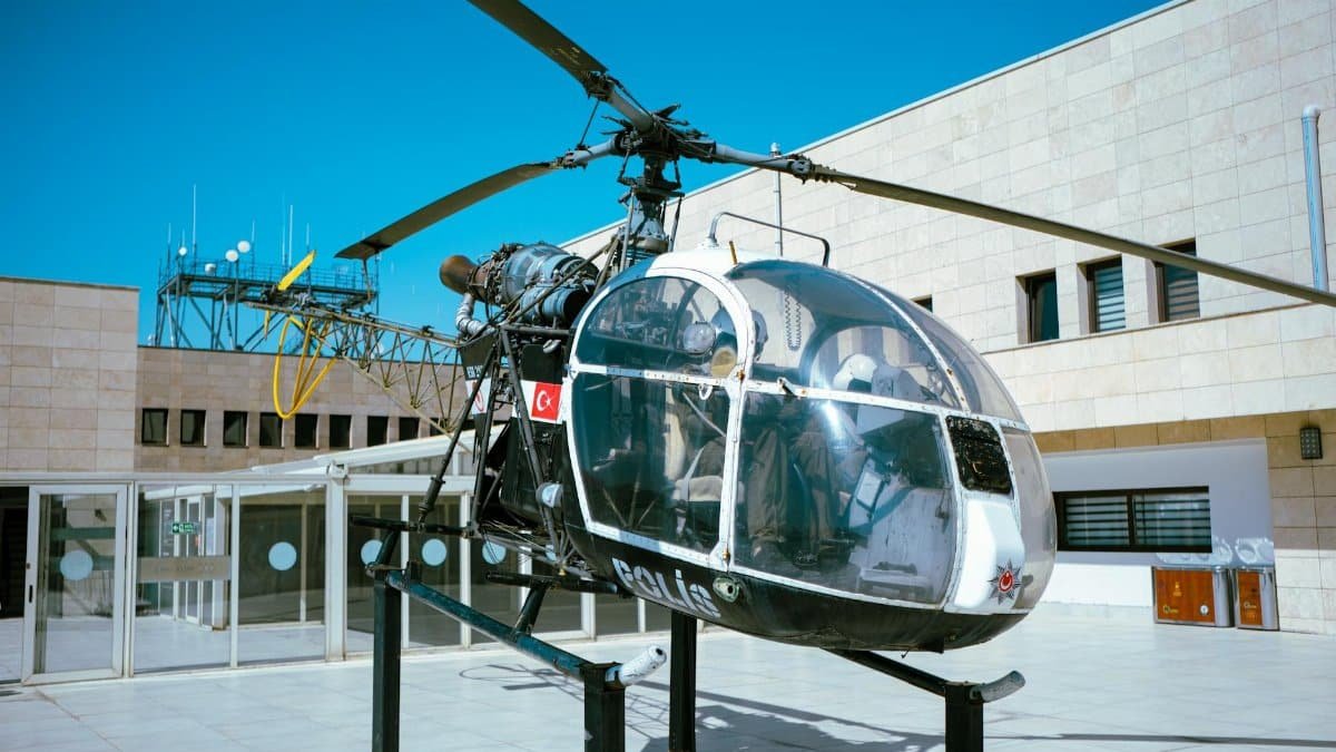 Close-up of a vintage police helicopter display at a museum in Ankara, Türkiye.