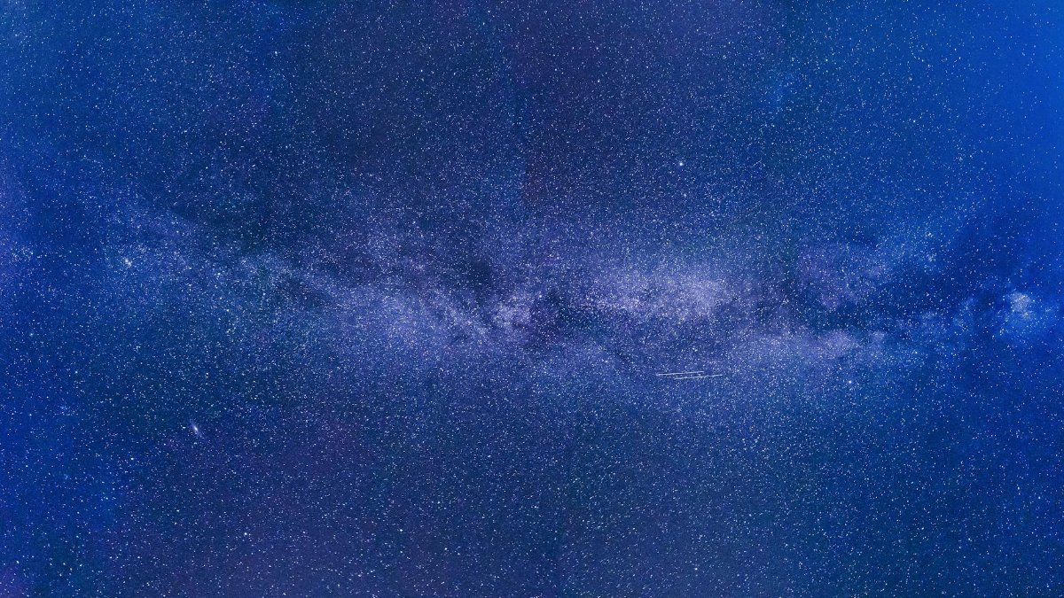 Stunning view of the Milky Way under a starry night sky, showcasing the universe's grandeur.