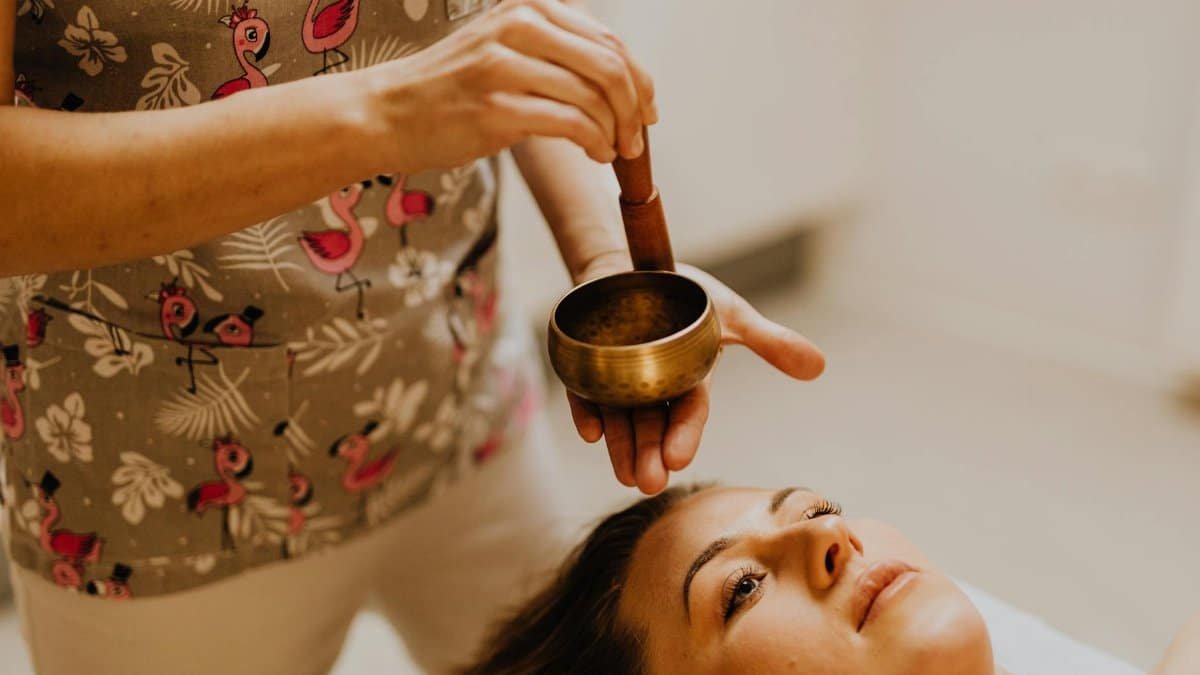 Calming therapy session with Tibetan singing bowl for relaxation and stress relief.