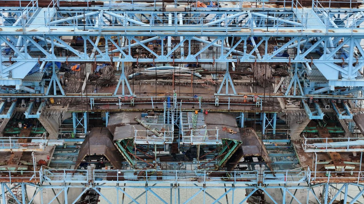 Detailed aerial image of bridge construction with steel framework in Ho Chi Minh City.
