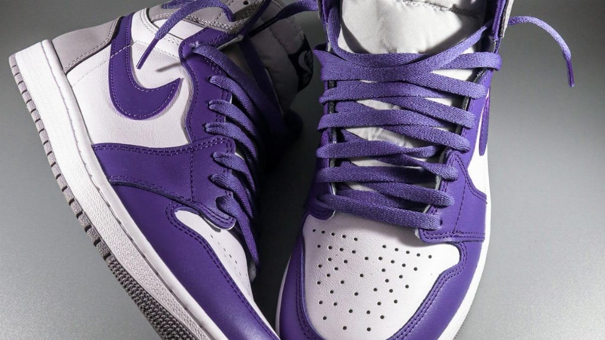 Stylish purple and white Nike Air sneakers in a modern close-up view.