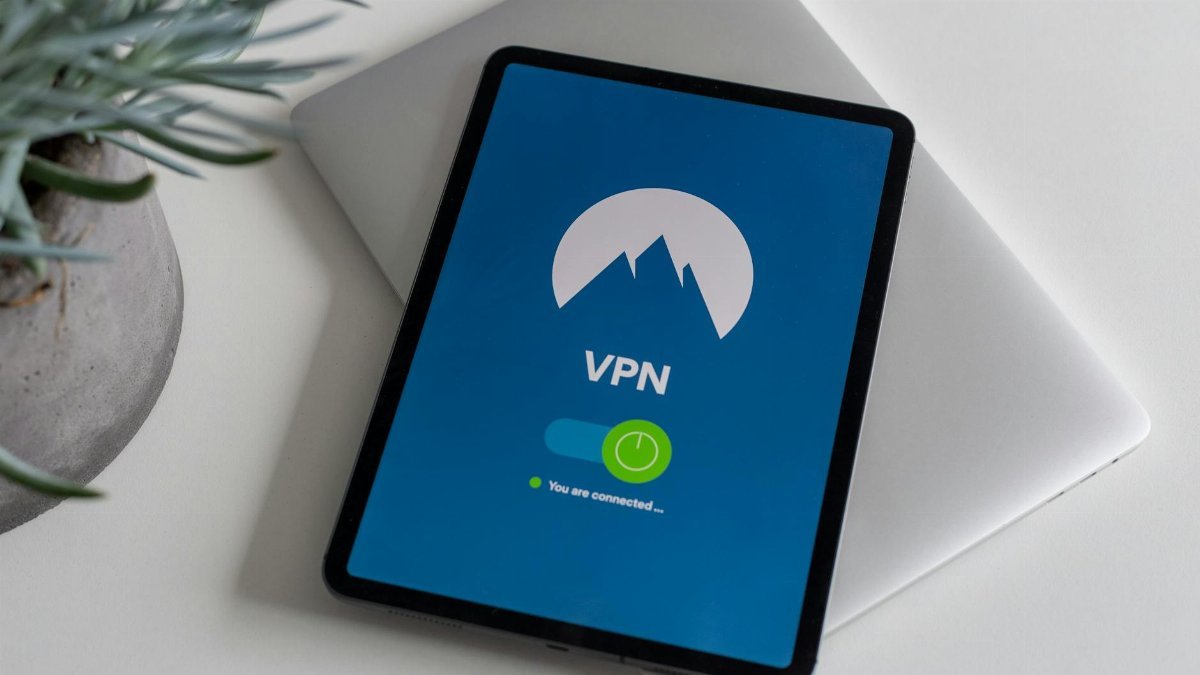 Modern tablet displaying a connected VPN app screen, symbolizing cybersecurity.