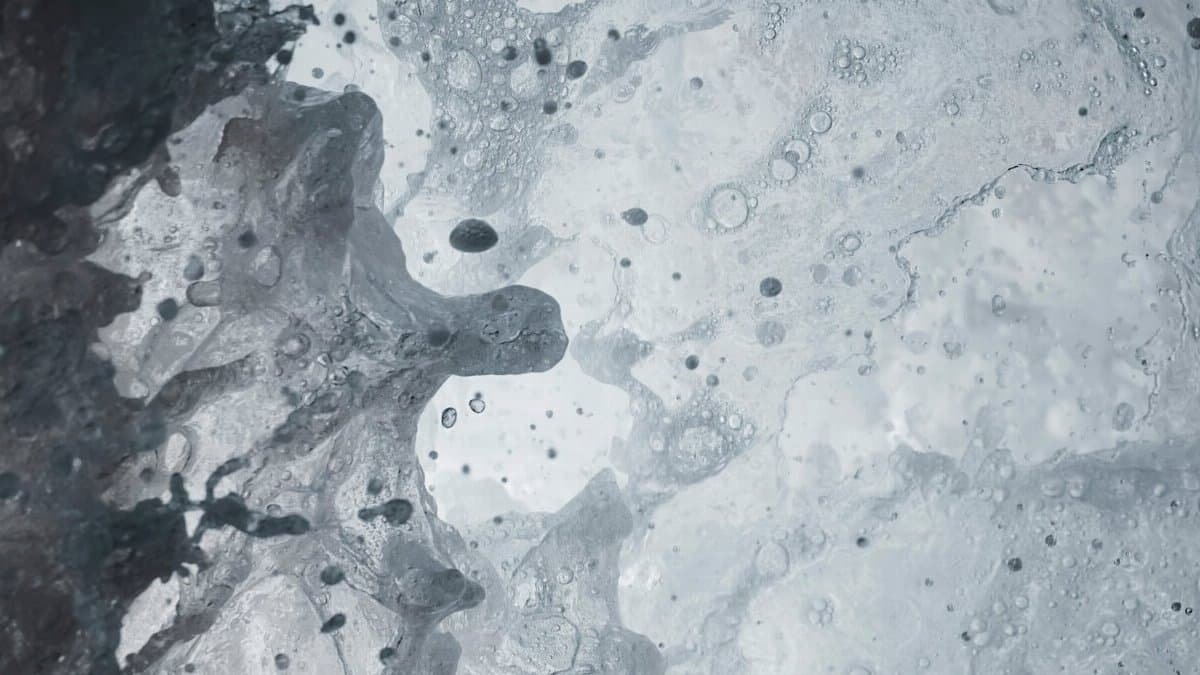 Close-up of a dynamic ocean wave capturing the motion and texture of the water splash.