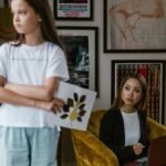 A mother and daughter share an emotional moment at home, highlighting family dynamics.