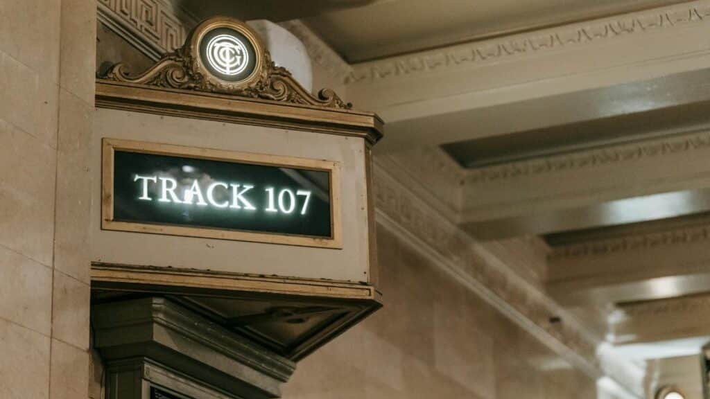 Classic subway station sign for Track 107 with elegant architectural details.