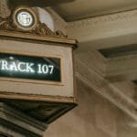 Classic subway station sign for Track 107 with elegant architectural details.