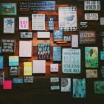 A warm and inviting indoor space with motivational quotes displayed on a wooden wall.