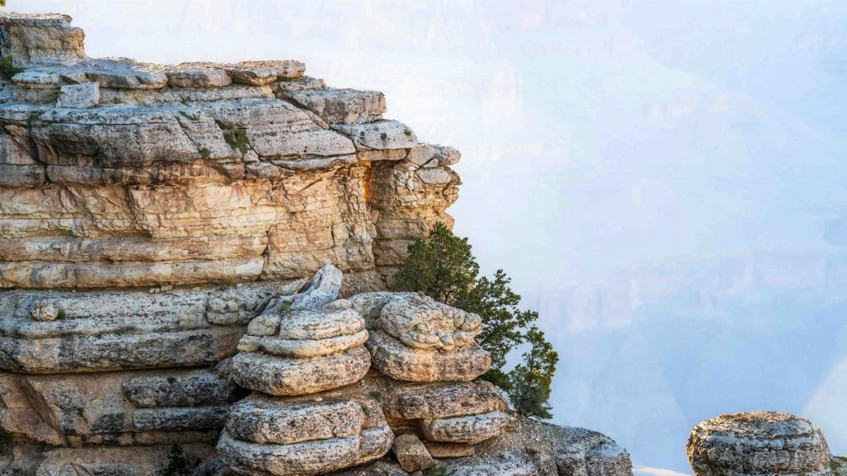 "Majestic serenity — where the vastness of the Grand Canyon meets the clarity of endless blue skies."