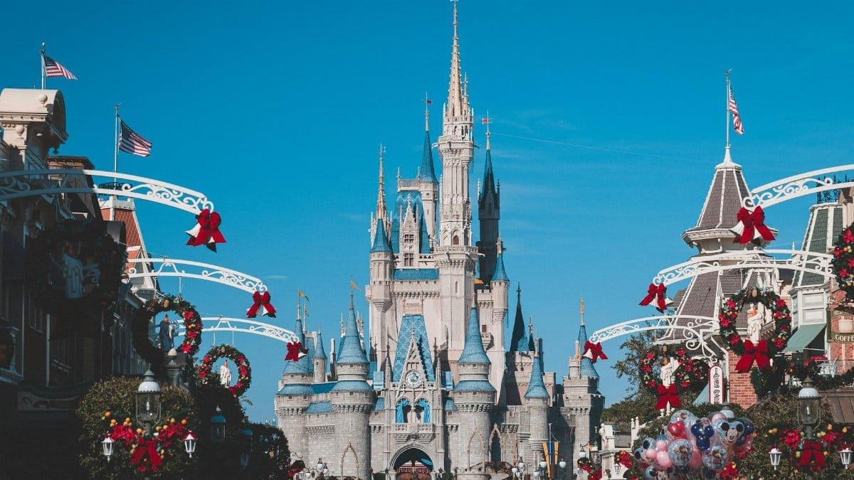 Cinderella Castle at Disney World's Magic Kingdom adorned for holiday festivities, Orlando, Florida.