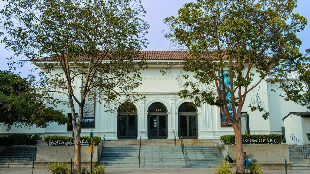 Front view of Santa Barbara Museum of Art with trees framing the entrance.