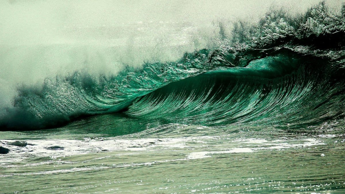 A stunning capture of a powerful ocean wave, showcasing nature's force and beauty in vivid detail.