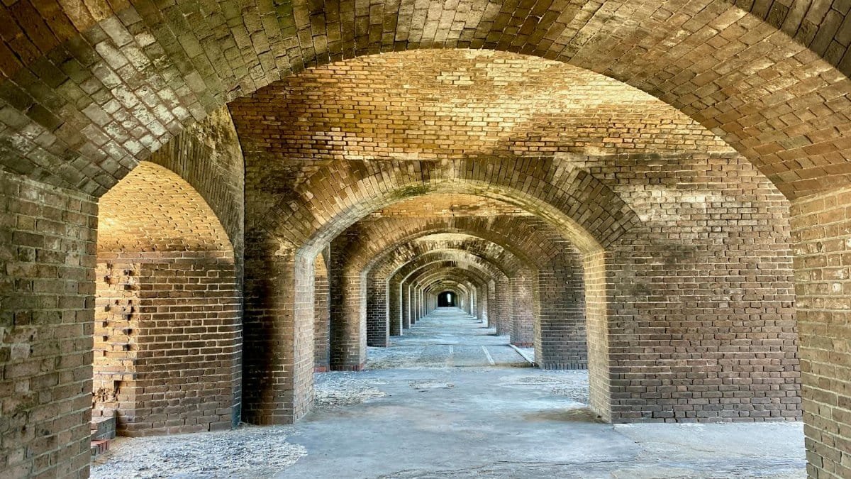 Explore the timeless beauty and architecture of Fort Jefferson's brick arches in Key West, Florida.