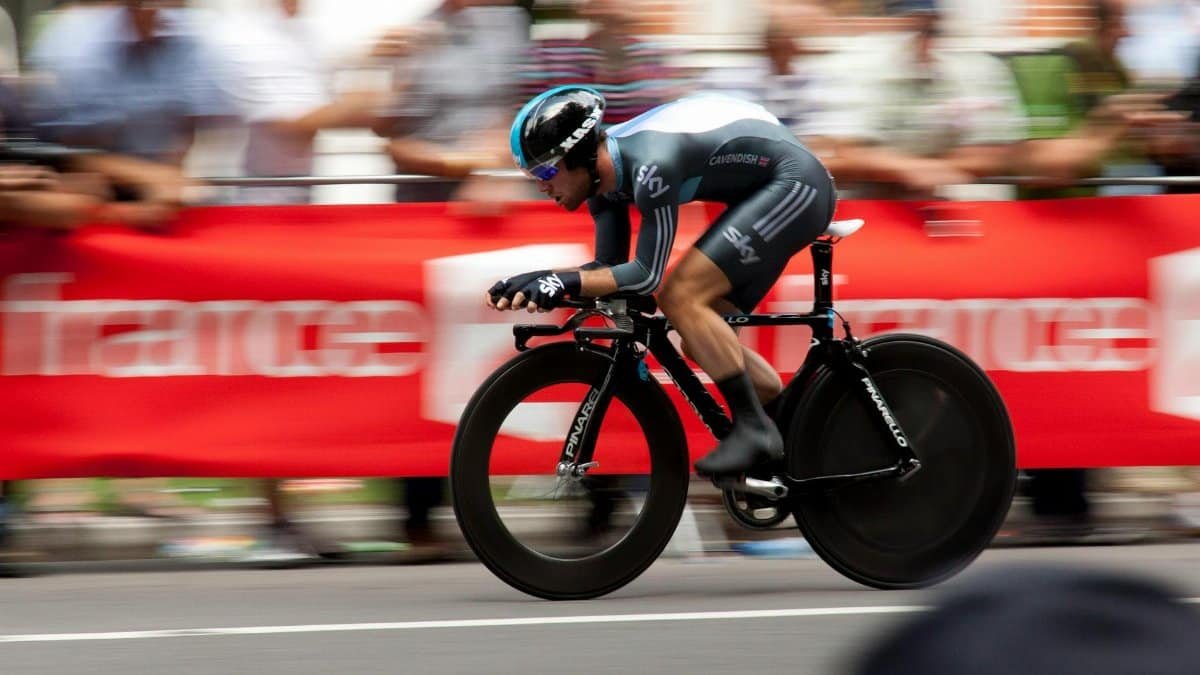 Dynamic shot of a cyclist competing in a fast-paced cycling event, showcasing speed and athleticism.