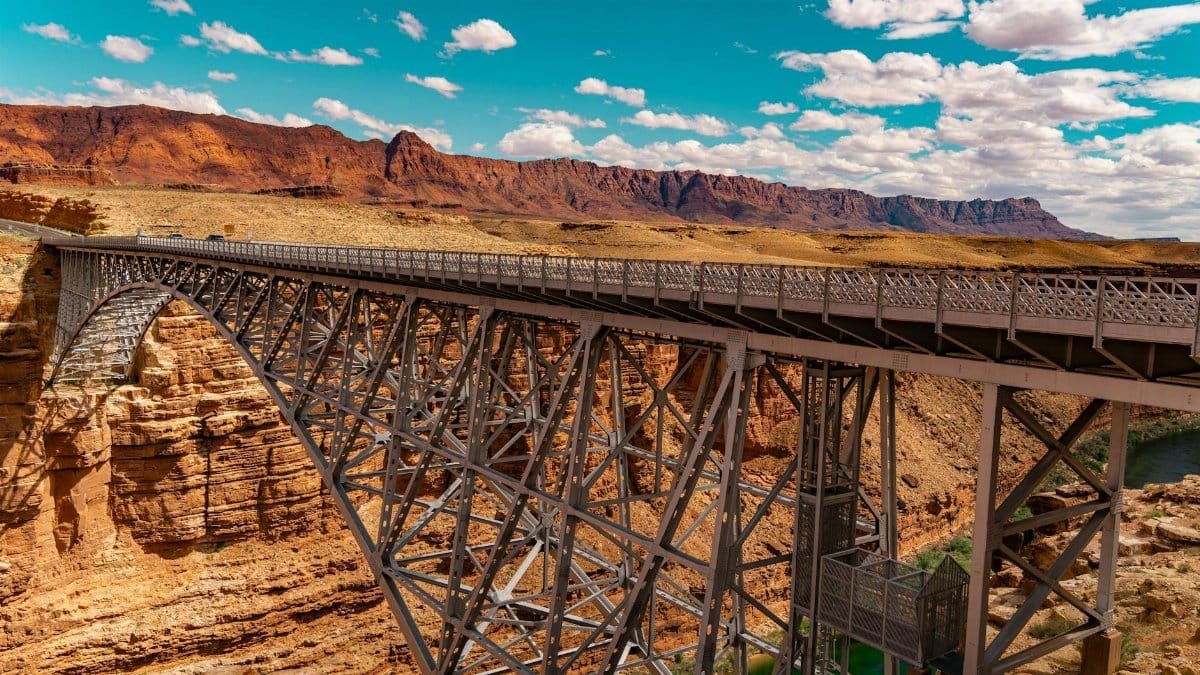 The iconic Navajo Bridge over Marble Canyon in Arizona with stunning desert landscape.