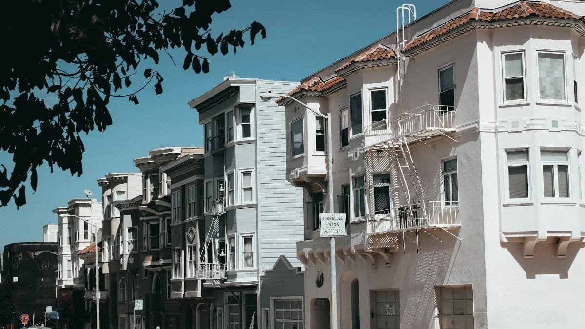 A tranquil street view showcasing classic San Francisco architecture with charming homes and calm urban vibes.