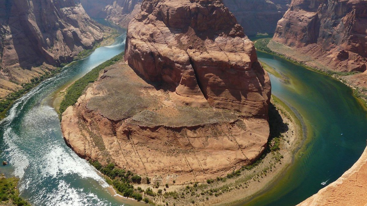 Stunning aerial view of Horseshoe Bend, Arizona with the Colorado River carving through the canyon.