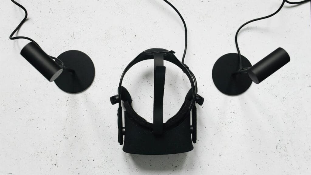 Top view of a VR headset and sensors, highlighting modern technology.