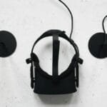 Top view of a VR headset and sensors, highlighting modern technology.