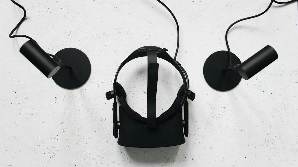 Top view of a VR headset and sensors, highlighting modern technology.