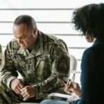 A therapy session for military veterans focusing on mental health and PTSD support.