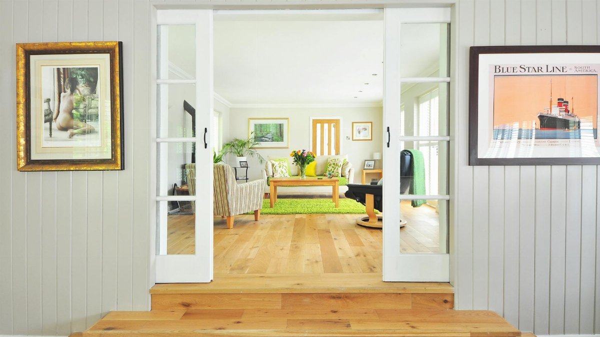 A bright and open living room showcasing contemporary interior design and luxury furnishings.