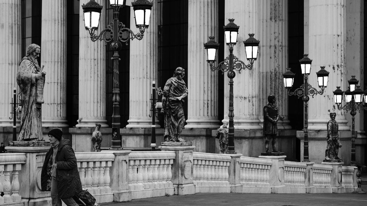 Free stock photo of architecture background, man sitting, museum architecture