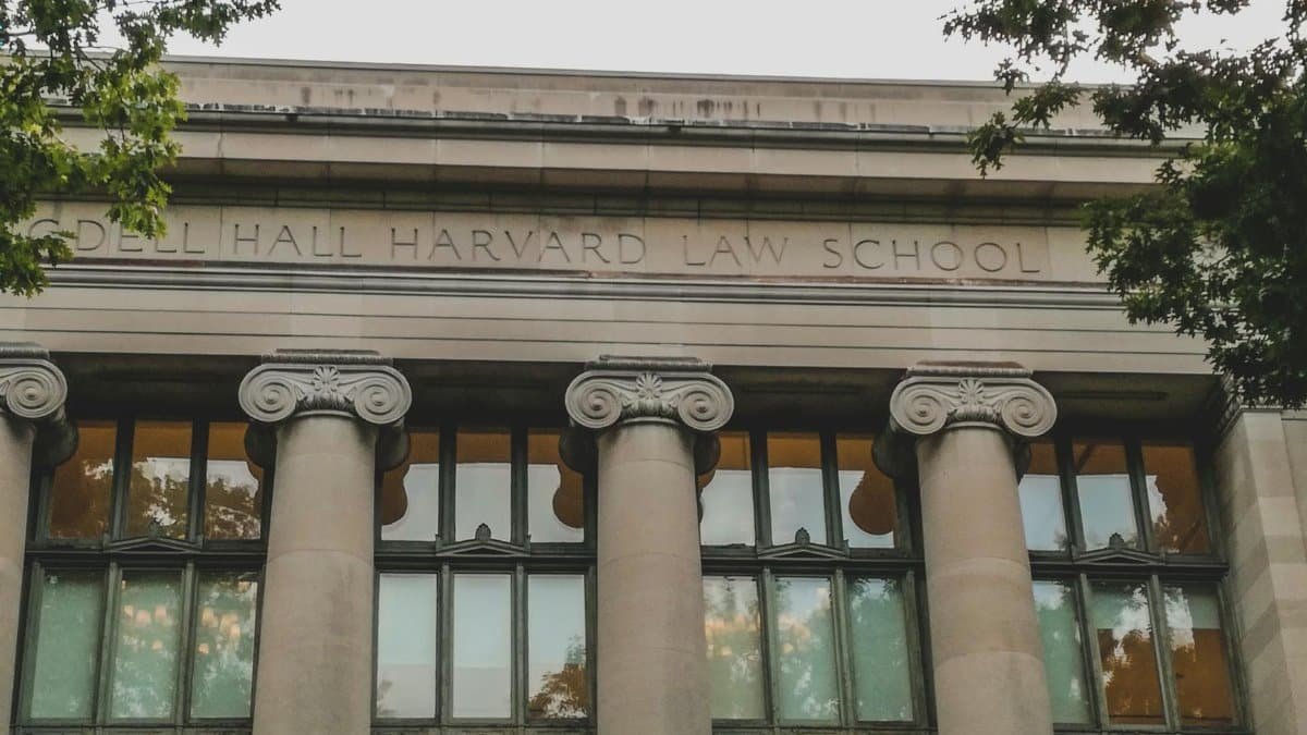 Classical architecture of Harvard Law School's facade with iconic columns, perfect for educational themes.