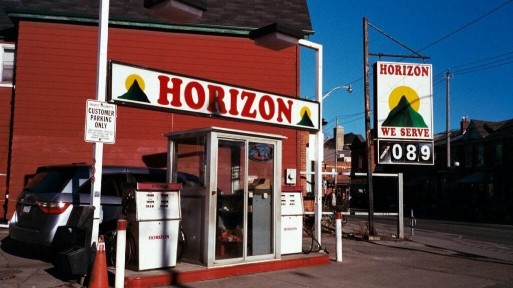 Explore a classic gas station in old Toronto, featuring nostalgic design and vintage pumps.